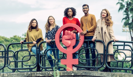 A diverse group standing together in solidarity